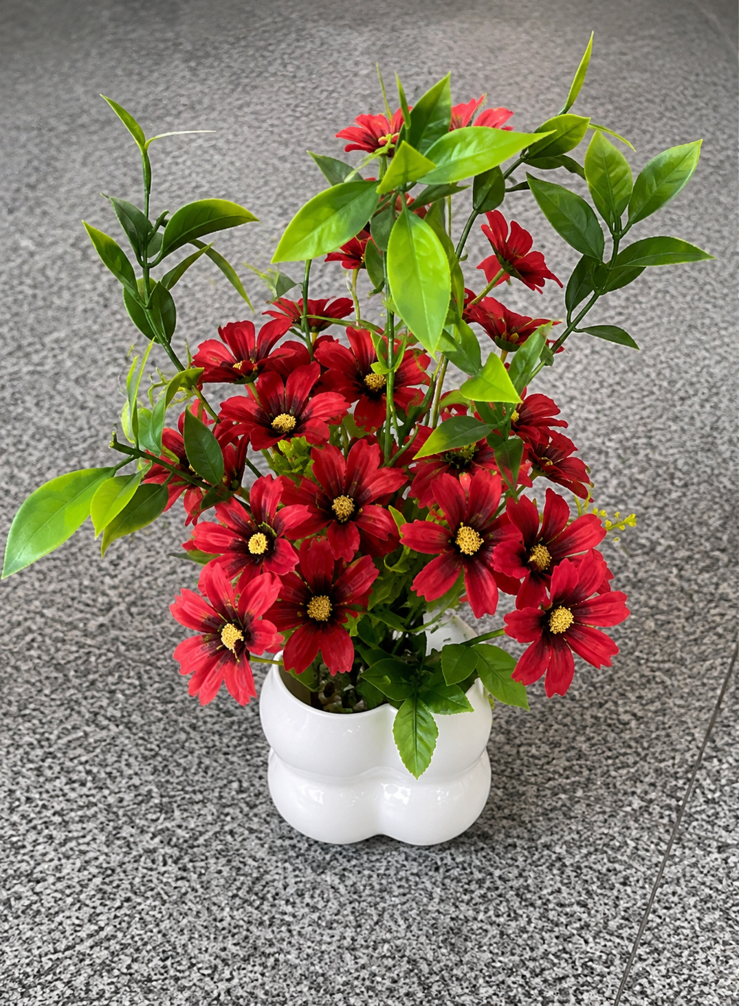 Artificial Red Daisy Floral Arrangement in White Pot